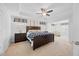 Spacious main bedroom with a tray ceiling, neutral carpet, and two bedside tables at 190 Bingham Creek Dr, Garner, NC 27529