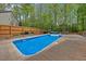 Inviting in-ground pool perfect for relaxation and recreation, complemented by a spacious patio area at 190 Bingham Creek Dr, Garner, NC 27529