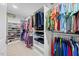 Spacious walk-in closet with ample shelving and hanging space for clothes and shoes at 190 Bingham Creek Dr, Garner, NC 27529