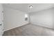 Empty bedroom with neutral walls and carpet featuring a single window at 20 Carolina Maple Dr, Franklinton, NC 27525