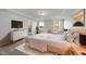 Relaxing main bedroom with a plush bed, soft rug, and an en suite bathroom at 20 Carolina Maple Dr, Franklinton, NC 27525