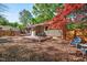 Great backyard with wood deck, chairs and privacy fence at 201 Dunhagan Pl, Cary, NC 27511