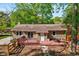 Charming single story home with a wood deck perfect for outdoor dining and entertaining at 201 Dunhagan Pl, Cary, NC 27511