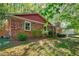 Exterior view of brick home showing roof and side yard at 201 Dunhagan Pl, Cary, NC 27511