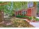 Charming brick home featuring a well-manicured lawn and inviting front entrance at 201 Dunhagan Pl, Cary, NC 27511