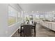 Dining area with large windows providing natural light and backyard views at 205 Fig Tree Bnd, Zebulon, NC 27597