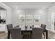 Dining area with backyard views and a door to the backyard at 205 Fig Tree Bnd, Zebulon, NC 27597
