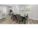 Light and bright dining area with backyard views at 205 Fig Tree Bnd, Zebulon, NC 27597