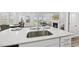 Open concept kitchen with a spacious island, connecting to the living and dining areas at 205 Fig Tree Bnd, Zebulon, NC 27597