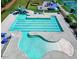 Aerial view of community pool with water slide and playground. Great amenities for Gathering fun! at 2109 Hemlock Hill Dr, Durham, NC 27703