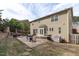 Expansive backyard with a patio, seating area, manicured lawn, and mature landscaping offers a private outdoor space at 2109 Hemlock Hill Dr, Durham, NC 27703