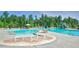 Large community pool with a splash pad and waterslide, perfect for summer fun and recreation at 2109 Hemlock Hill Dr, Durham, NC 27703