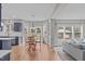Bright dining area with bay window, hardwood floors, and seamless flow into a living space for easy entertaining at 2109 Hemlock Hill Dr, Durham, NC 27703