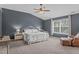 Main bedroom with a trey ceiling, plush carpet, and lots of natural light at 2109 Hemlock Hill Dr, Durham, NC 27703