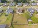 Aerial view of the property highlighting the large backyard and surrounding neighborhood at 2113 Conroy Way, Willow Springs, NC 27592