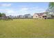 Large backyard provides space for recreation and outdoor activities at 2113 Conroy Way, Willow Springs, NC 27592
