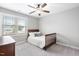 Bright bedroom with a ceiling fan and plenty of natural light at 2113 Conroy Way, Willow Springs, NC 27592