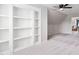 Bonus room featuring built in shelving and carpet floors at 2113 Conroy Way, Willow Springs, NC 27592