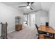 Bonus room featuring a ceiling fan and a rustic wood desk at 2113 Conroy Way, Willow Springs, NC 27592