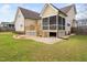 Backyard deck, screen porch and stone patio provides ample outdoor living space at 2113 Conroy Way, Willow Springs, NC 27592