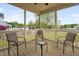Screened in back porch with an outdoor seating area at 2113 Conroy Way, Willow Springs, NC 27592