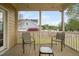 Screened in back porch featuring an outdoor seating area at 2113 Conroy Way, Willow Springs, NC 27592