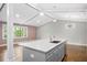 Bright kitchen showcases a large island with seating, perfect for entertaining and everyday living at 2120 Hillock Dr, Raleigh, NC 27612