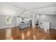 Spacious living space features hardwood floors, recessed lighting, and an open concept layout at 2120 Hillock Dr, Raleigh, NC 27612