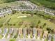 Aerial view of a community with a golf course at 2124 Castle Pines Dr, Raleigh, NC 27604