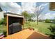Backyard featuring a grill and a view of the golf course at 2124 Castle Pines Dr, Raleigh, NC 27604
