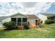 Landscaped backyard with a deck and a view of the property at 2124 Castle Pines Dr, Raleigh, NC 27604
