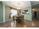Charming dining area boasts a tray ceiling, stylish lighting, and an open layout at 2124 Castle Pines Dr, Raleigh, NC 27604