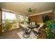 Cozy screened-in porch with comfortable seating and relaxing outdoor views at 2124 Castle Pines Dr, Raleigh, NC 27604