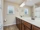 Bathroom features a double sink vanity with plenty of counter space and modern fixtures at 2125 Toad Hollow Trl, Apex, NC 27502