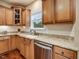 Kitchen area with granite countertops, stainless steel appliances, custom cabinetry, and modern fixtures at 2125 Toad Hollow Trl, Apex, NC 27502