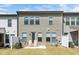 Spacious backyard with lawn and patio; a lovely space for relaxing or entertaining outdoors at 2129 Mars Hill Ln, Apex, NC 27502