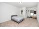 Bedroom with carpet, a twin bed, and two windows at 2129 Mars Hill Ln, Apex, NC 27502