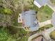 Aerial view of a home with a tiered wooden deck and screened porch at 213 Lewiston Ct, Cary, NC 27513