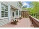 Lovely back deck featuring outdoor chairs and wood railings at 213 Lewiston Ct, Cary, NC 27513