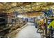 Unfinished basement with insulation, exposed pipes, and storage space at 213 Lewiston Ct, Cary, NC 27513