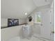 Cozy powder room with unique decor, including a world map and a round mirror at 213 Lewiston Ct, Cary, NC 27513