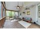 Relaxing screened porch featuring vaulted ceilings, ceiling fans, and comfortable seating at 213 Lewiston Ct, Cary, NC 27513