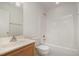 Clean bathroom featuring a shower-tub combo, single vanity, and a neutral color scheme at 22 Lure Ct, Durham, NC 27713