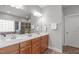 The bathroom has a double vanity, a separate tub and shower, and neutral paint at 232 Vinewood Pl, Holly Springs, NC 27540