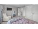 Inviting bedroom showcasing a sitting area, vanity, and plenty of closet space at 232 Vinewood Pl, Holly Springs, NC 27540
