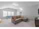 Large bonus room with comfortable seating, a pool table, and neutral decor at 232 Vinewood Pl, Holly Springs, NC 27540