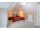 Bedroom with sloped ceilings, a queen bed, and carpet flooring at 2404 Gillingham Dr, Apex, NC 27539