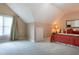 Bedroom featuring a queen bed, carpet flooring and sloped ceilings at 2404 Gillingham Dr, Apex, NC 27539