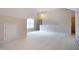 Spacious bonus room with neutral walls, sloped ceiling, and natural light at 2404 Gillingham Dr, Apex, NC 27539