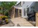 Spacious wooden deck with flower pots and a grill, perfect for outdoor enjoyment and barbecues at 2404 Gillingham Dr, Apex, NC 27539